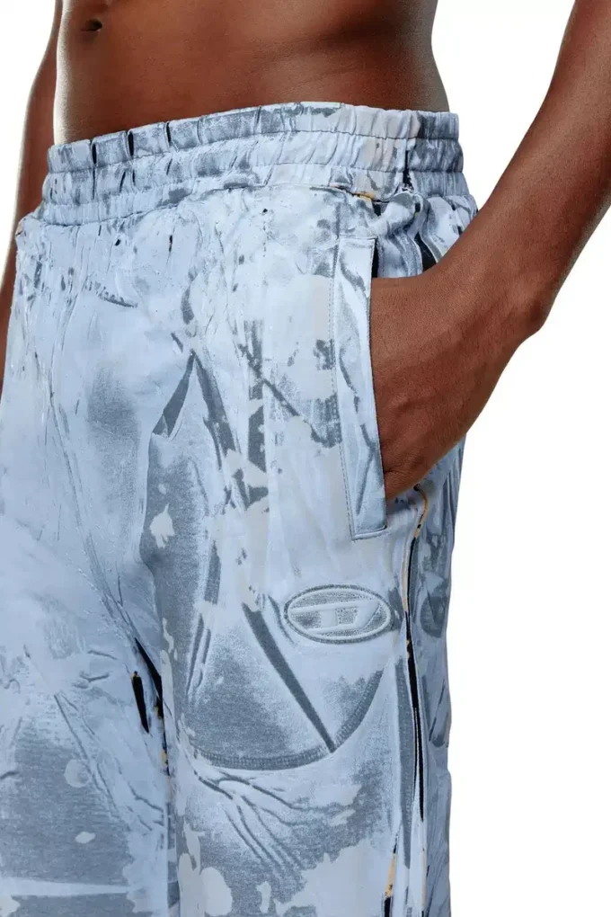 p-belb-p1 Flared track pants in coated jersey p-belb-p1 Flared track pants in coated jersey