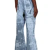 p-belb-p1 Flared track pants in coated jersey p-belb-p1 Flared track pants in coated jersey
